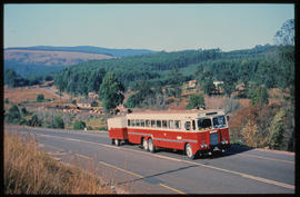 
SAR ERF bus with trailer in mountain pass.
