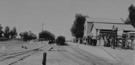Lady Grey Bridge (later Huguenot), 1895. Station building with well-dressed crowd on platform loo...