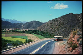 SAR Mercedes Benz tour bus in mountain pass.