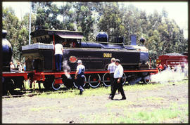 SAR Class A No 150 'Dubs' with SA Coal Estates Amcoal steam locomotive in the distance.
