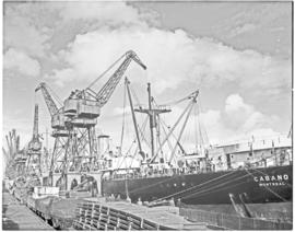 Port Elizabeth, 1948. Loading cranes with ship 'Cabano' in Port Elizabeth harbour.