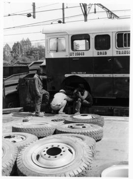 Johannesburg. Wheels being fitted to SAR International Harvester combination bus and truck No MT1...