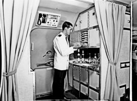 
Steward at work in galley of SAA Boeing 727.
