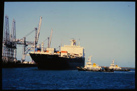 Port Elizabeth, September 1984. 'Ronsard' RoRo ship docking with two SAR tugs in Port Elizabeth H...
