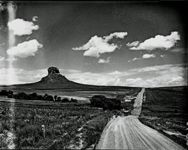 Bethlehem district, 1951. Country road passing prominent hill.