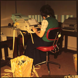 Punched paper tape operator.