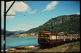 Cape Town, 1987. SAR type 5M2A between Glencairn and Sunny Cove on the Cape Town to Simon's Town ...