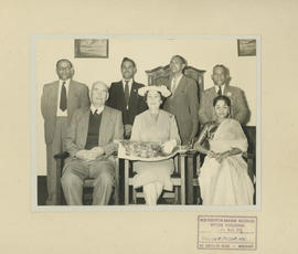 Durban, 19 August 1958. Mr C Rezelman of the SAR GM's Office, sitting on front left with Indian o...