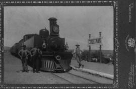 Cullinan, 1898. Three men with NZASM locomotive at station. (Nissen, Pretoria)