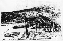 Humansdorp district, circa 1911. Gamtoos River bridge: Driving screw piles on the north side, pre...