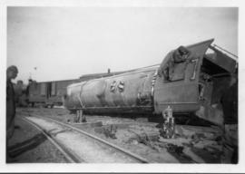 Derailed locomotive at station. (Lund collection)