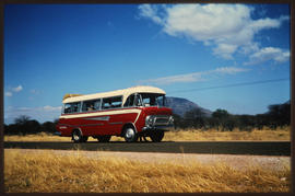Namibia, 1968. SAR GUY tour bus No MT6913 on the road.
