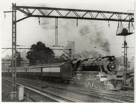 Johannesburg, 1937. SAR Class 16E No 857 with Union Express leaving station.