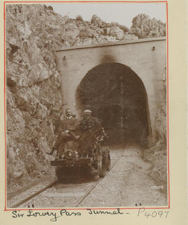 Gordon's Bay district. Two men on 6 hp trolley before Sir Lowry's Pass tunnel portal.