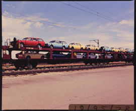 Midrand, October 1978. Motor car train with SAR type SCL-4 wagons with double brake system at Kaa...