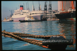 Durban, November 1974. SAR tug 'Jan Haywood' with the 'Windsor Castle' in Durban Harbour. [S Math...