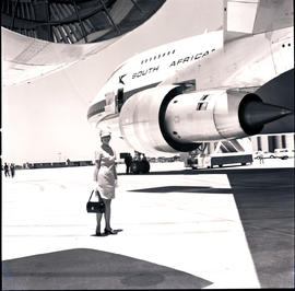 
SAA Boeing 747 ZS-SAN 'Lebombo'. Hostess standing next to engine.
