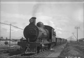 Cape Town district. SAR Class 6 locomotive on a goods train.