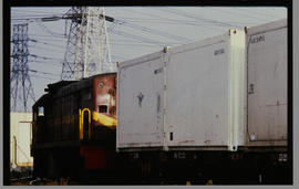Electrical locomotive with containers.