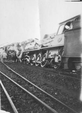 Bellville, circa 1925. Locomotive derailment.