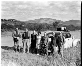 Louis Trichardt district, 1946. Group of people with car in open veld.