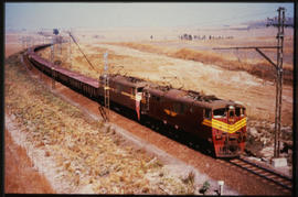 Germiston. Two SAR Class 6E1's Srs 4 on ore train at Rooikop.