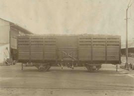 CSAR short open wagon filled with coal.