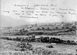 Pretoria, early 1902. Derailed armoured train on the Daspoort - Hercules section after speeding t...