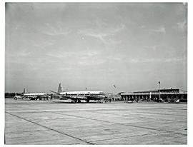 Durban, 1965. Louis Botha airport. Two SAA Vickers Viscount aircraft on apron, showing buildings....