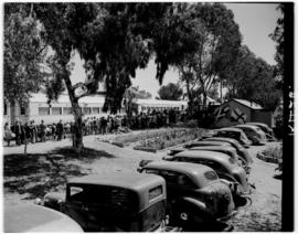 Wonderkop, 10 March 1947. Crowd beside the Royal train R7.  Flags of South Africa, St Andrews and...