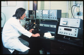 August 1978. Chemist measuring trace elements on atomic absorption spectrophotometer. [V Gilroy]