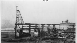 Wilderness, circa 1926. Kaaimans River bridge construction: Driving piles for the temporary bridg...