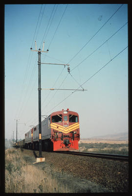 SAR Class 7E No 7008 with ore train on the Sishen Saldanha line.