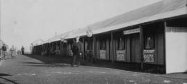 Vryburg, 1895. Station building with railwayman posing. (EH Short)