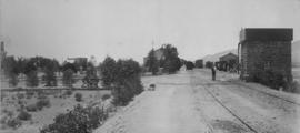 Matjiesfontein, 1895. Looking north from station with water tank in foreground. (EH Short)