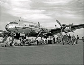 Johannesburg, 1950. Palmietfontein airport. SAA Lockheed Constellation ZS-DBR 'Cape Town'. Loadin...