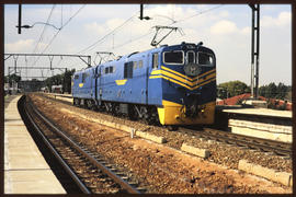 July 1990. SAR Class 12E with 'Blue Train' headboard.