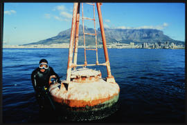 Cape Town, 1987 SAR diver at ocean buoy.