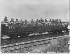 Johannesburg, 9 to 18 March 1922. Soldiers behind sandbags onSAR type D-8 drop sided wagon.