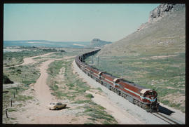 
Five SAR Class 34-500 locomotives in Iscor livery with ore train on the Sishen-Saldanha line.
