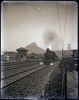 Cape Town. SAR Class 10 passing the signalling building near the  military hospital  west  of Woo...