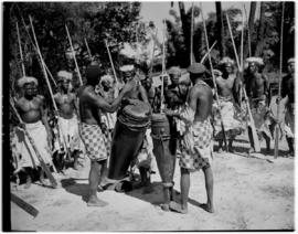 Livingstone, Northern Rhodesia, 11 April 1947. Drummers and warriors on shore of Zambezi River.