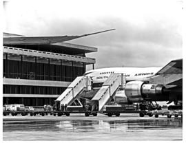 Johannesburg, 1972. Jan Smuts Airport. SAA Boeing 747 at terminal building.