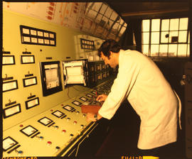 Pretoria, May 1981. Instrument maker checking panel at Koedoespoort. [D Dannhauser]