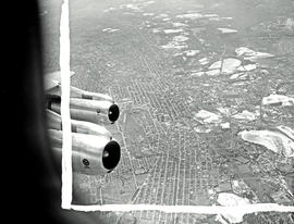 
SAA Boeing 707. Air to air. Shot of two engines through window.
