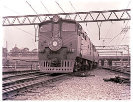 Johannesburg, 1961. SAR Class 5E Srs 3 No E582 with Blue Train leaving.