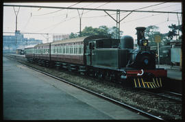 
NZASM 46 Tonner 'President Kruger' with passenger coaches.
