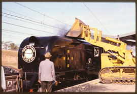 Tzaneen, May 1979. Coal being loaded into SAR Class GMAM with headboard 'Historic Transport Assoc...