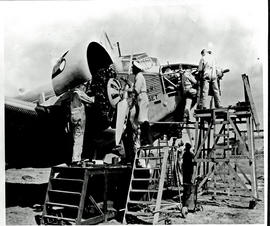 
Junkers Ju-52 ZS-AFB 'Lord Charles Somerset', technicians working on engines.
