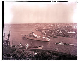 Durban, 1967. Tugs and ship entering Durban Harbour.